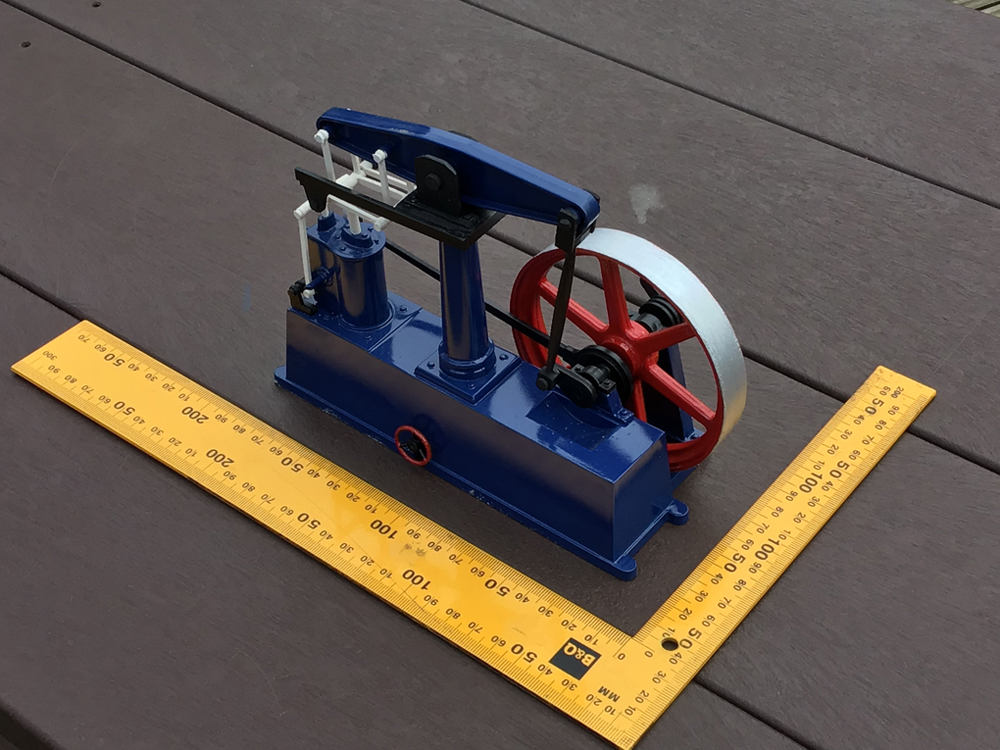 This stationary  steam engine was intended to be viewable from the open door of the mining company offices, but I inadvertently glued up the floor and couldn't get it in.  Ongoing project to find a place where it can be clearly viewed.